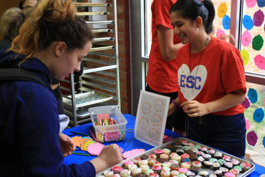 Sweet Treat: Eagle Service Club hands out Cope Cakes to members of the student body during suicide prevention week.