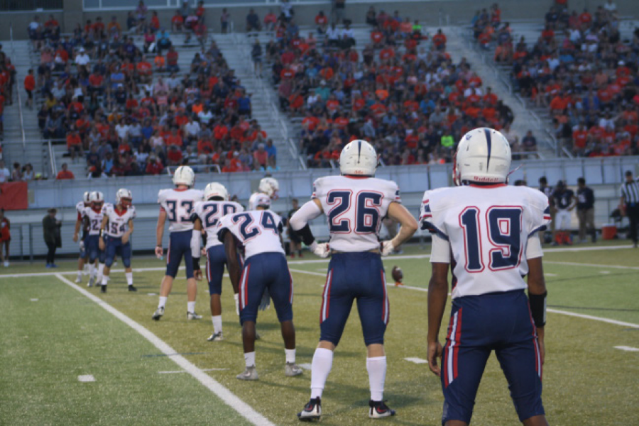 Olathe North football players line up as they prepare for the opening kickoff against Olathe East at the Olathe North vs. Olathe East game on August 31st.