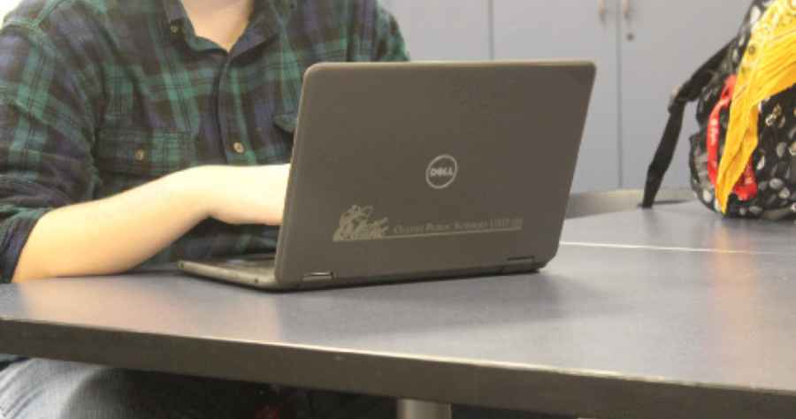 An Olathe North students school issued laptop