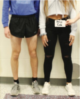 Comparison cross country shorts and the dress code in place for girls at Olathe North.