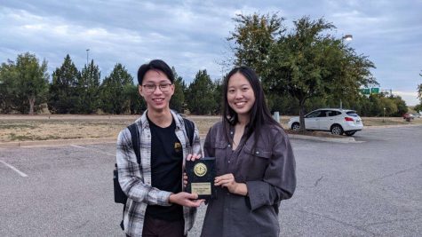 Debate partners Dai and Li holding their plaque after the Heritage Hall TOC Qualifier. | Photo courtesy of Isobel Li