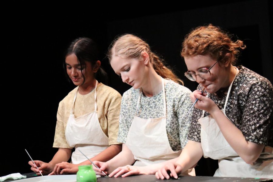 Junior Sareena Kandalkar, junior Mikayla Pelletier, and senior Rowan Riggs play dial painters, who later became ill due to the radium paint they ingested at work.