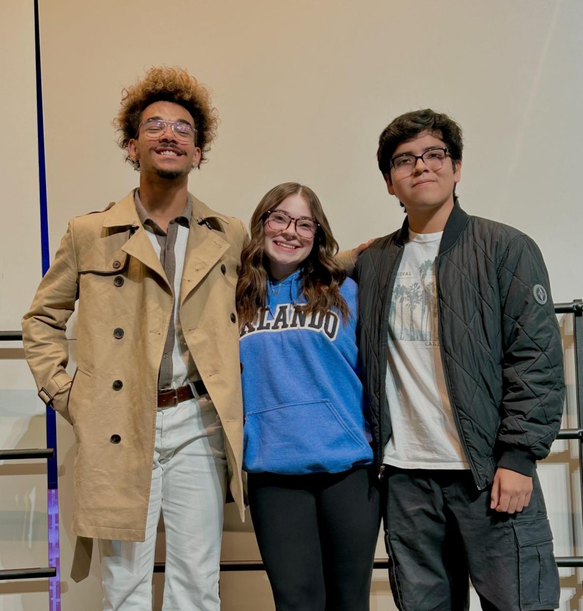 Ainslee Magee (12), Ben Stone II (12), and Kenyth Carlos (12) posing together while practicing for audtions